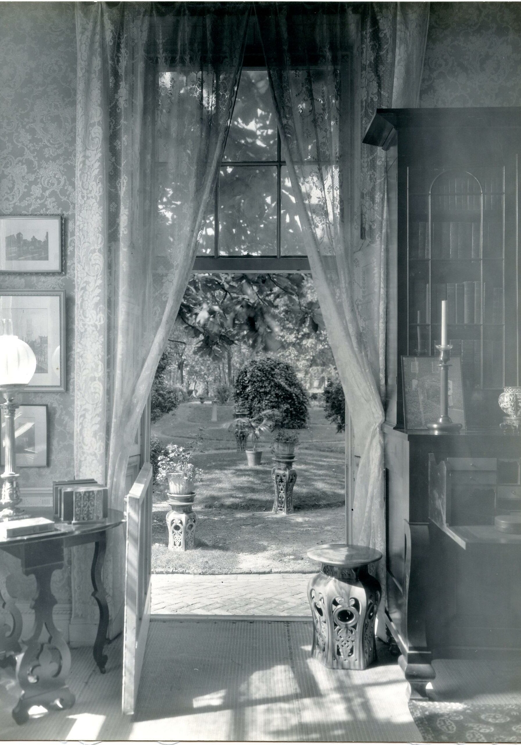 black-and-white historic photograph of an open window